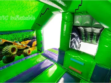 dinosaur themed inflatable bounce-and-slide attraction detail view