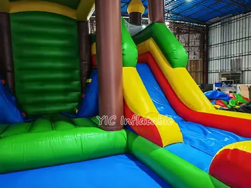 Green Castle Bounce House Combo with Dual Slides commercial attraction view