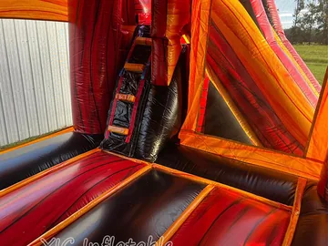 monster truck themed inflatable bounce-and-slide attraction detail view