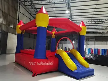 Red Castle Bouncy Castle with Slide side view