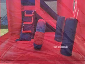 superhero themed inflatable bounce-and-slide attraction detail view