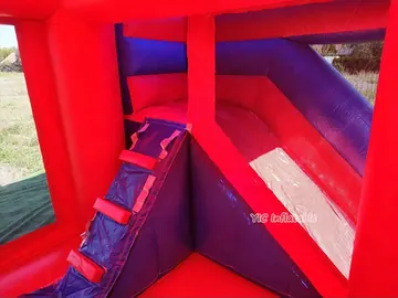 superhero themed inflatable bounce-and-slide attraction detail view