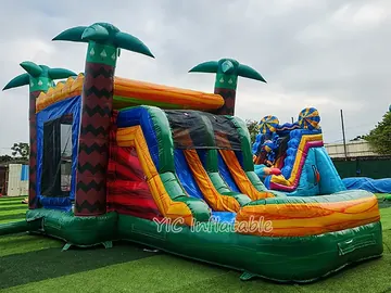 tropical themed inflatable bounce-and-slide attraction detail view