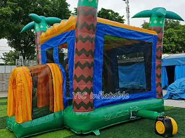 tropical themed inflatable bounce-and-slide attraction detail view