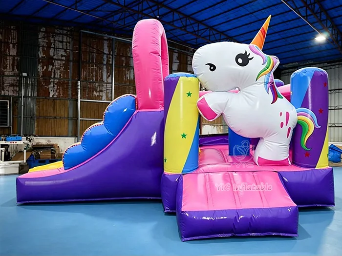unicorn themed inflatable bounce-and-slide attraction front view