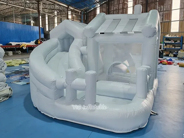 White bounce house with pool and slide product image