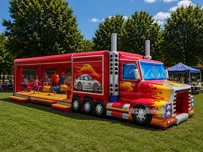 truck themed inflatable challenge course front view