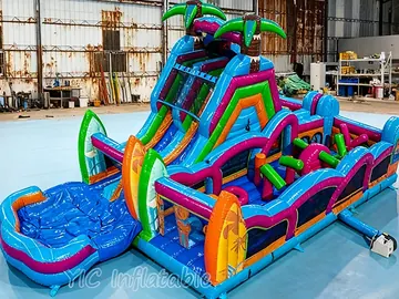 tropical themed inflatable challenge course rear view