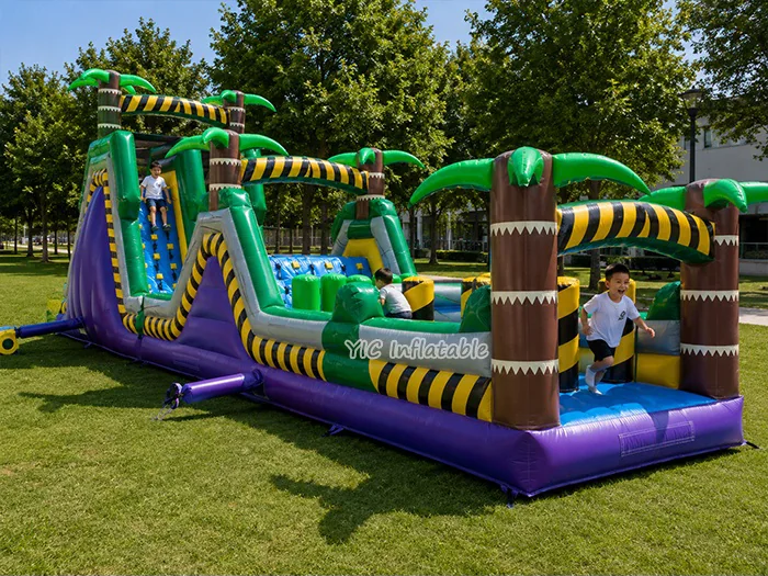 tropical themed inflatable challenge course front view